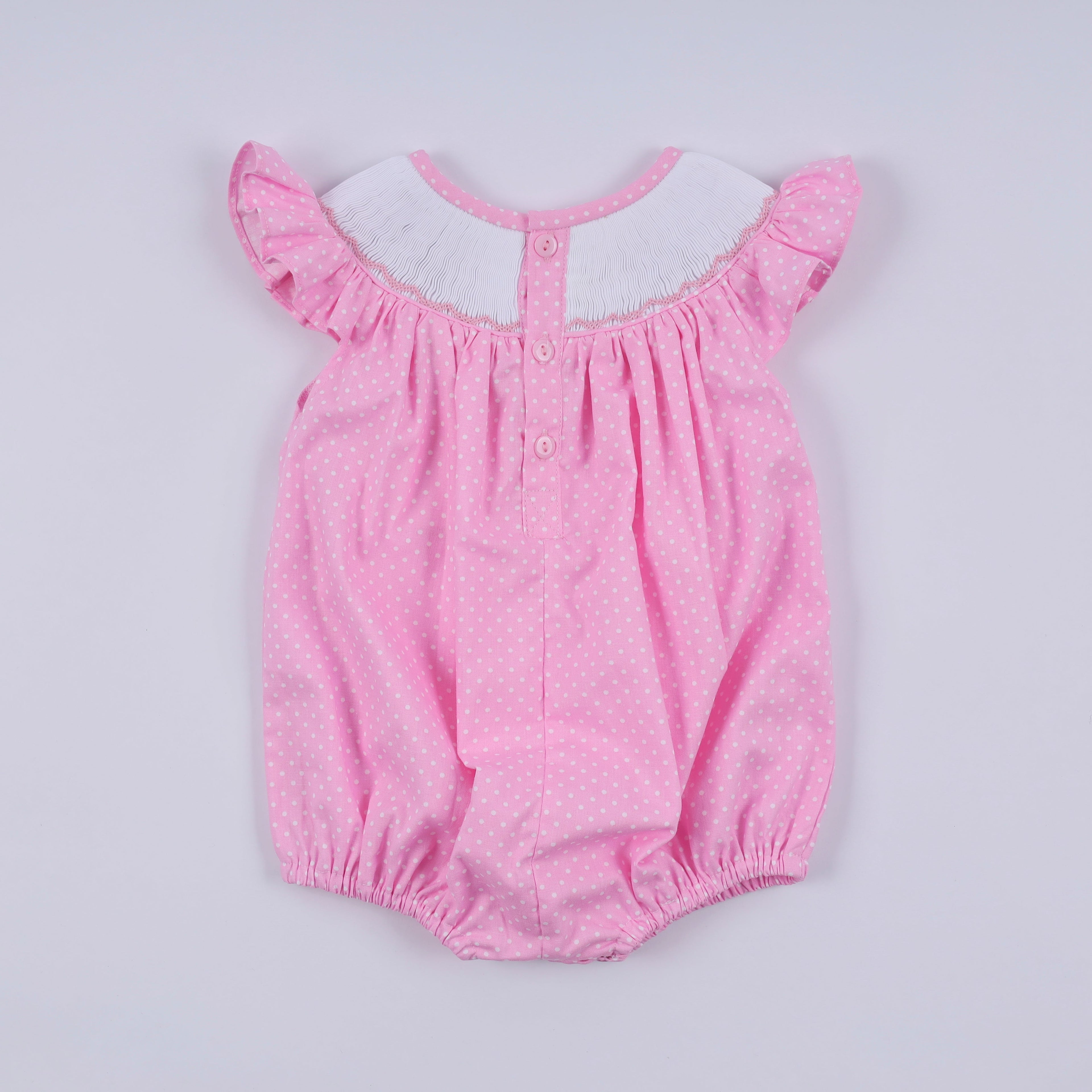 Pink character hand smocked dot ruffle bubble